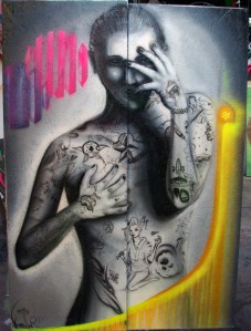 Cachez moi ce sein tatoué que je ne saurai voir. peinture aérosols et aérographe sur deux panneaux OSB de 50/120 cm, 2014